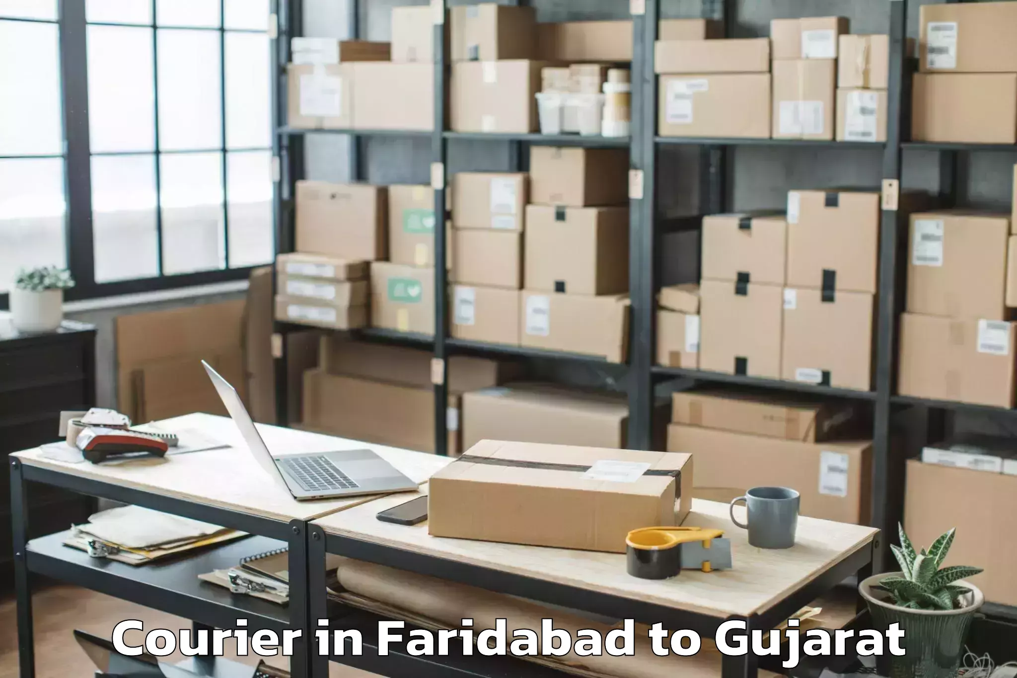 Easy Faridabad to Netrang Courier Booking